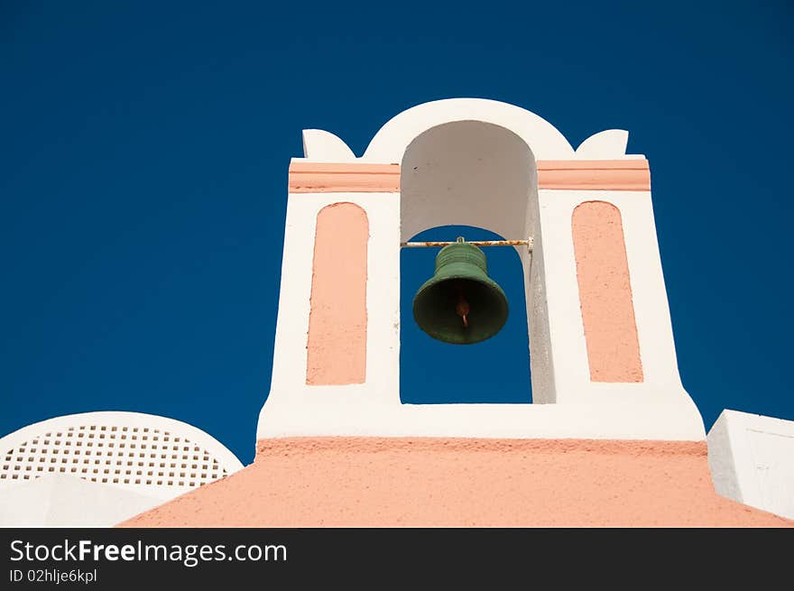 Greek church in santorini greece with a cross