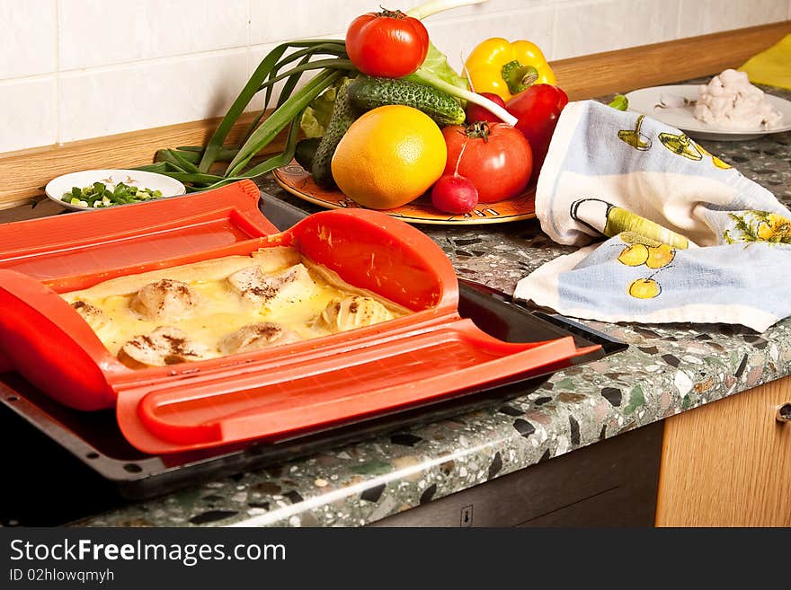 Colorful products and hot cake on kitchen. Colorful products and hot cake on kitchen