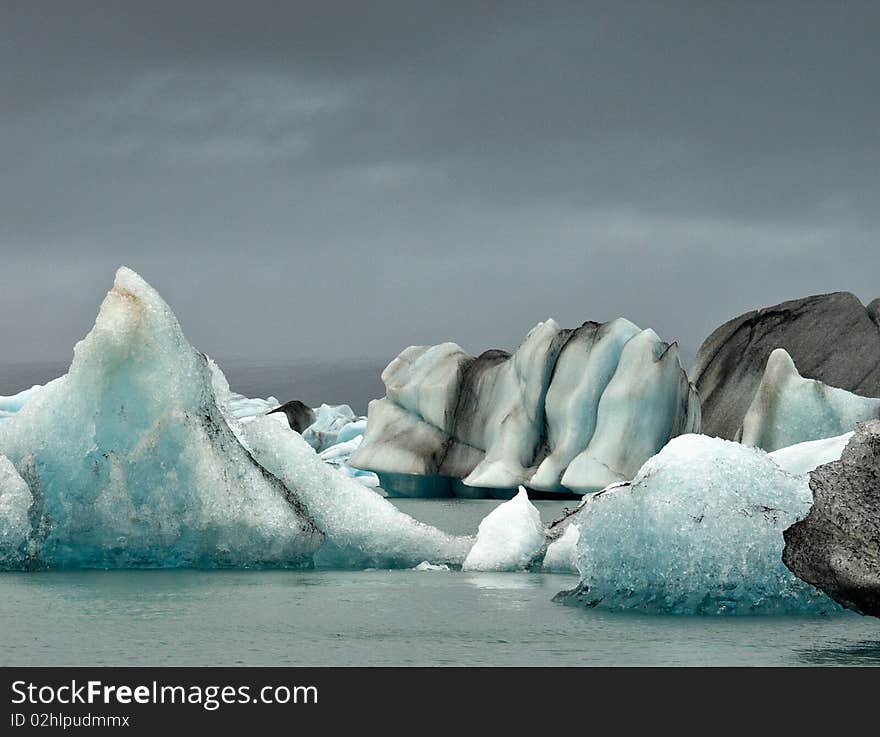 Jokulsarlon lake at Iceland. Icebergs on the surface. Jokulsarlon lake at Iceland. Icebergs on the surface.