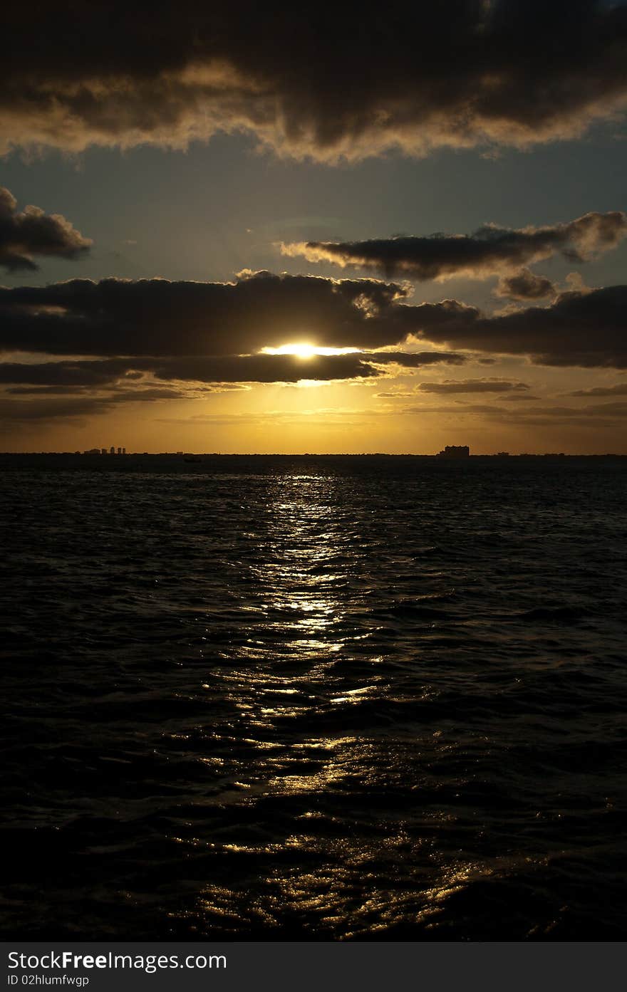 Beautiful setting sun over the waters of Biscayne Bay in Miami Florida. Beautiful setting sun over the waters of Biscayne Bay in Miami Florida