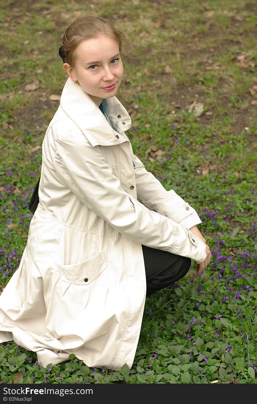 Female sitting on the field