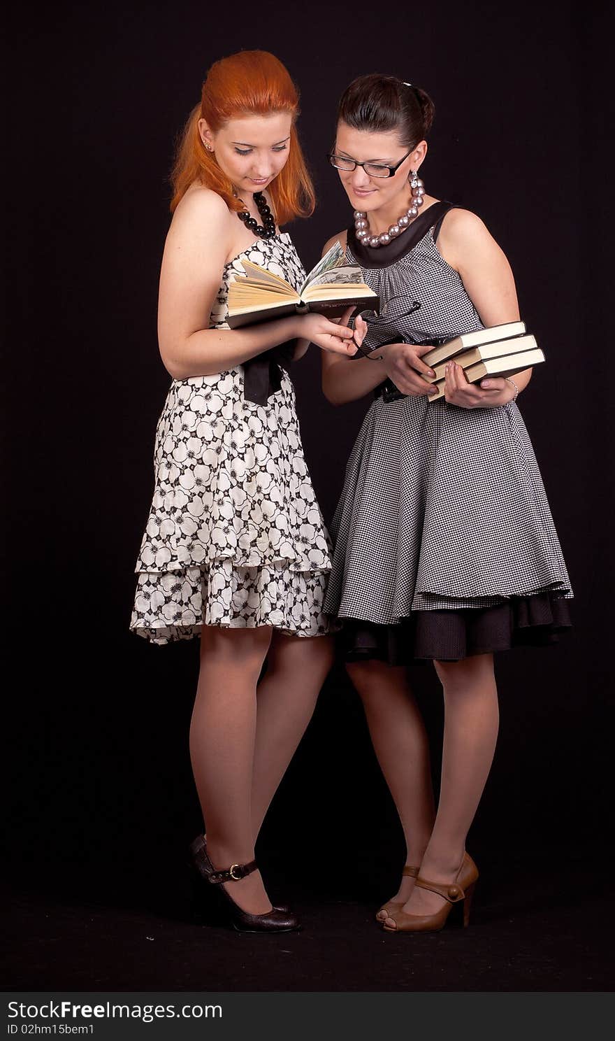 Two girls in dresses