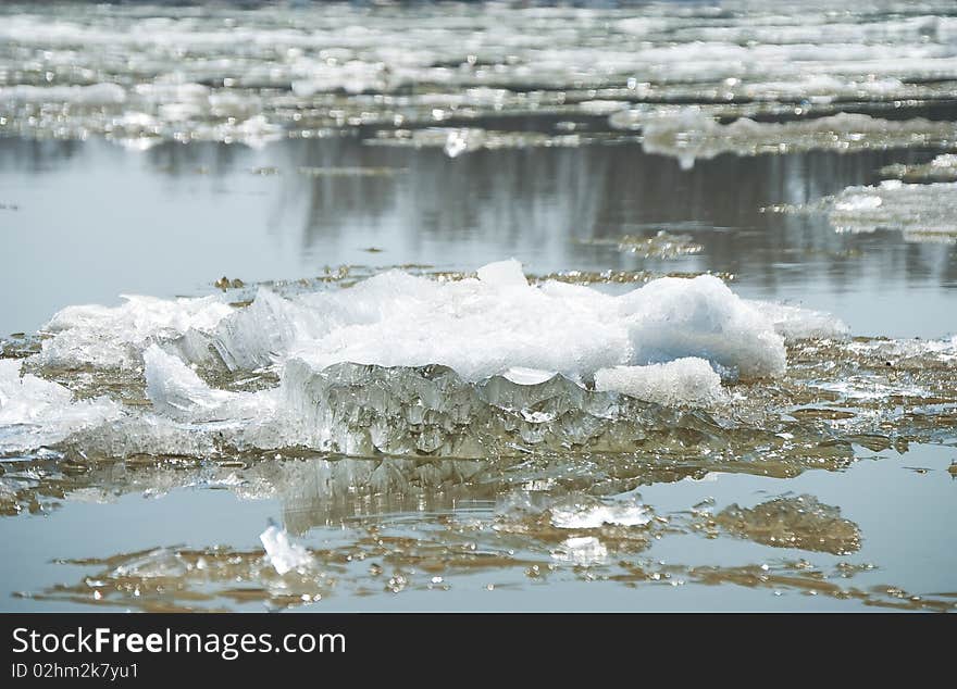 Snow and ice drift on surface of the river