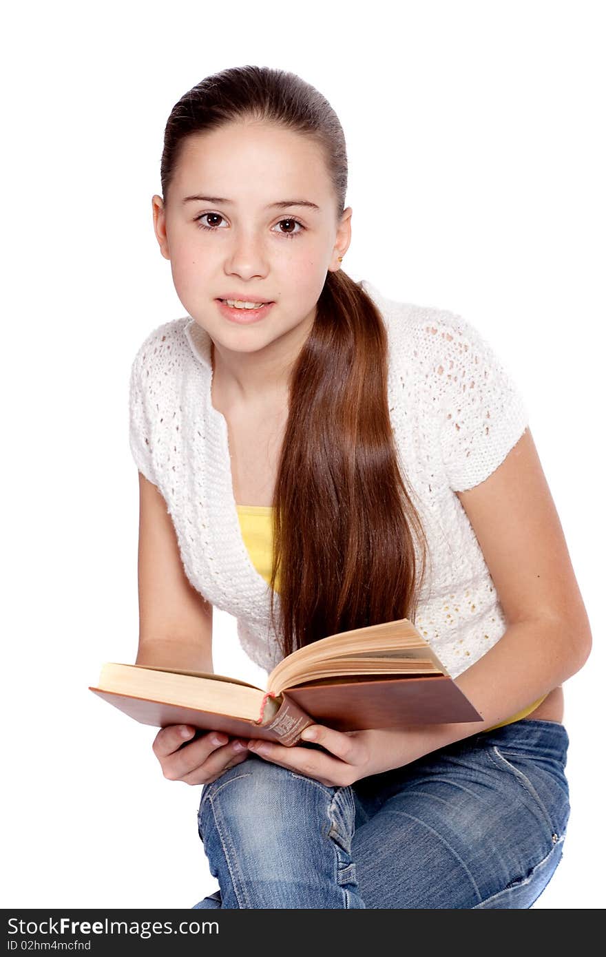 Girl reading book, isolated over white background