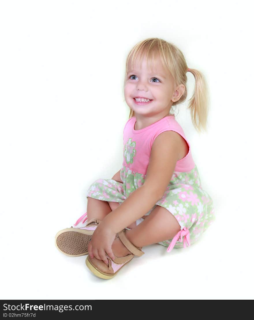 Cute toddler girl over white