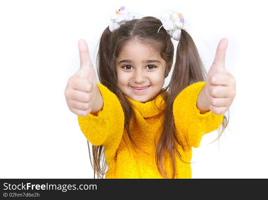 Young girl showing her thumbs up