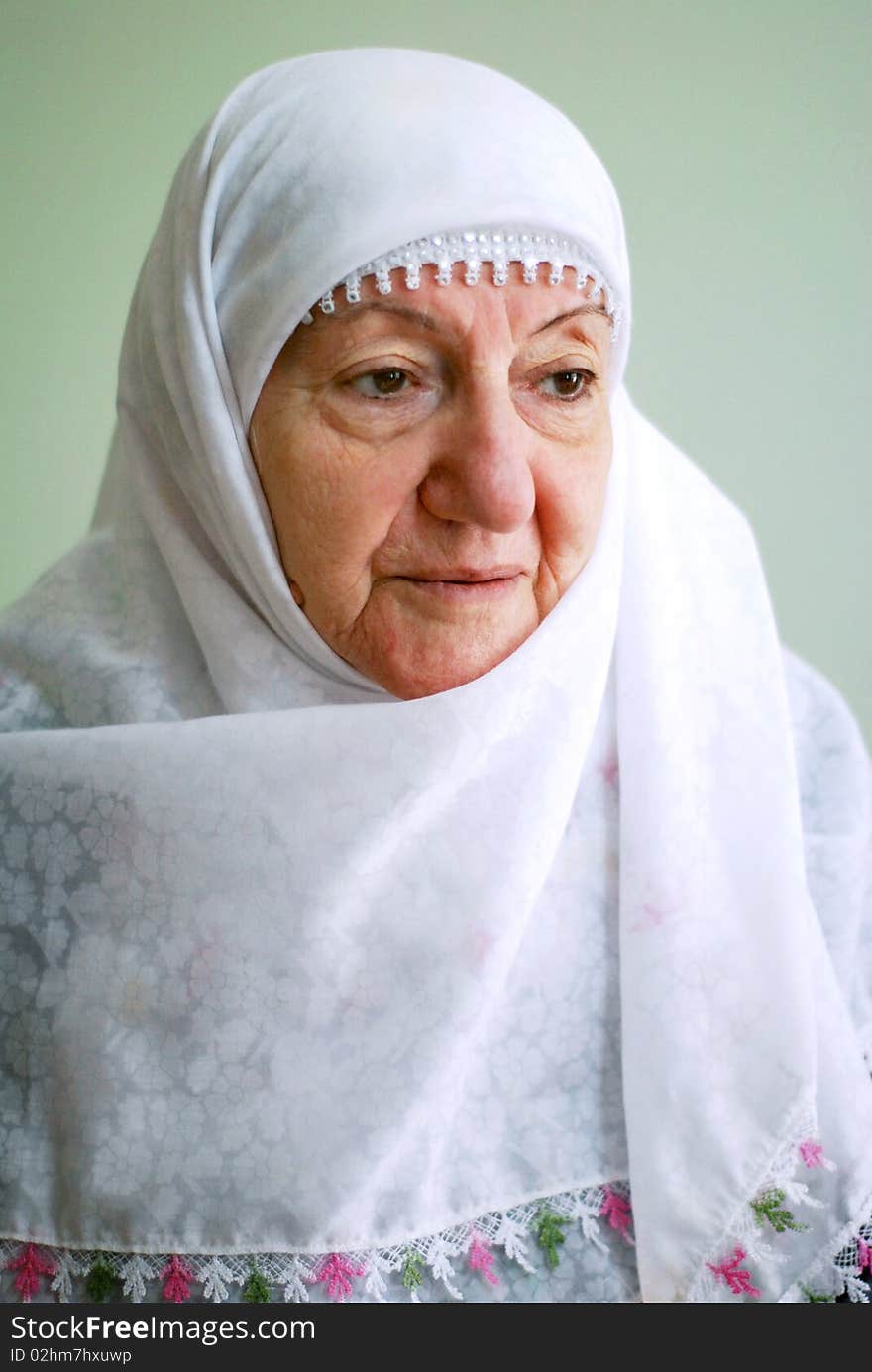 A portrait of senior muslim lady. A portrait of senior muslim lady