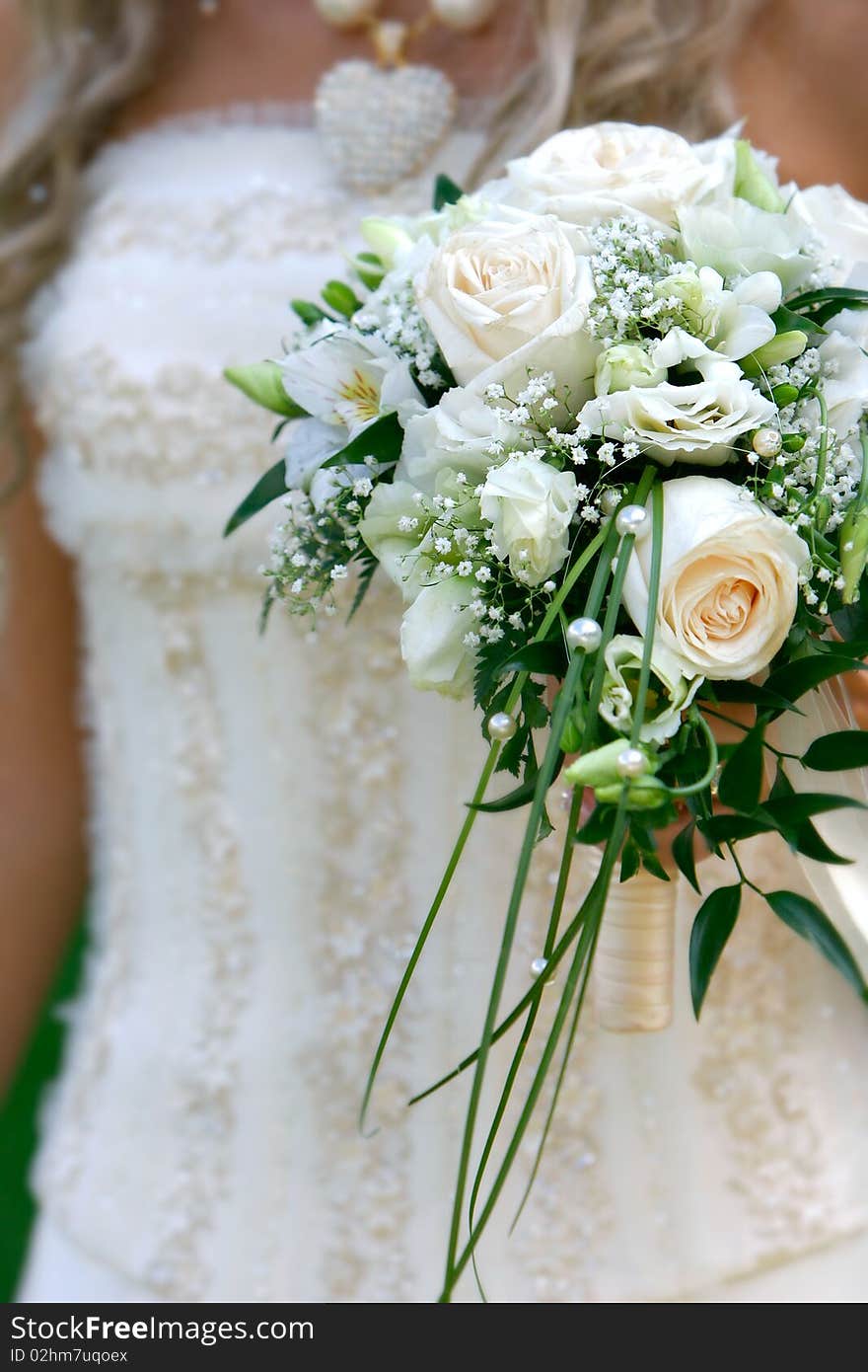 Wedding bouquet in bride s hands