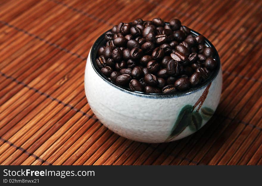 Coffee beans displayed in a cup