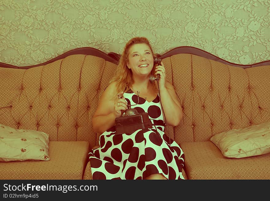 Vintage type image with smiling Caucasian woman on phone. Vintage type image with smiling Caucasian woman on phone.