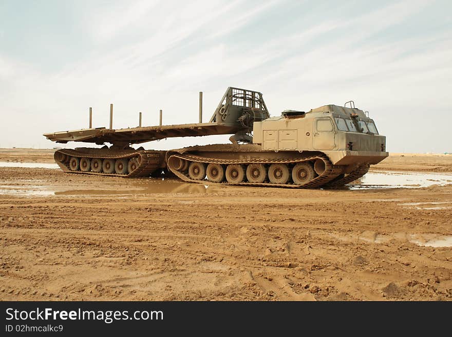 A powerful army truck all-terrain vehicle. Close-up. Day. A powerful army truck all-terrain vehicle. Close-up. Day.