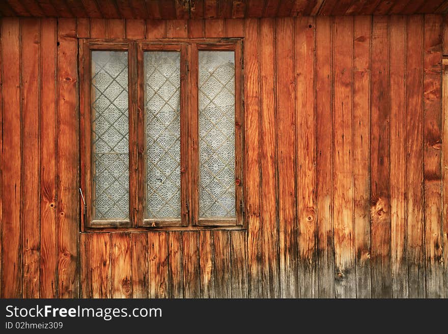 Old romanian wooden window with wall texture. Old romanian wooden window with wall texture