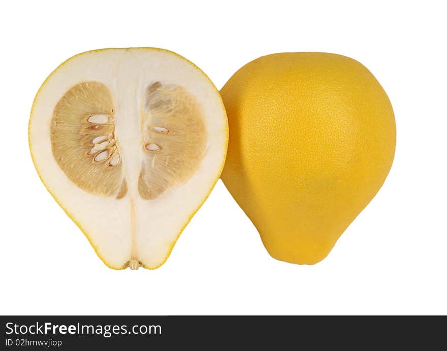 Two halves of fruit pomelo lie nearby