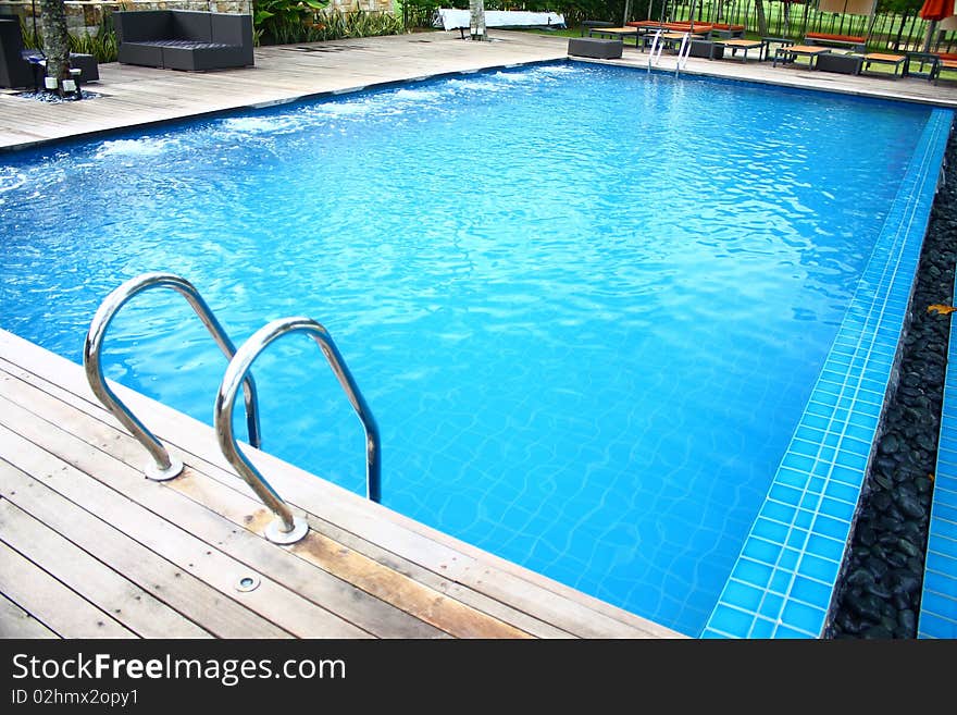 Luxury hotel poolside and ladder