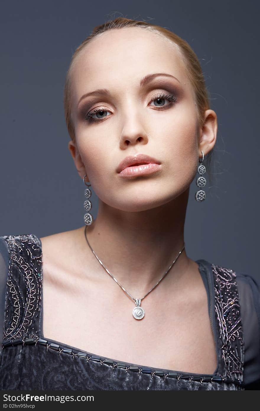 Close-up portrait of a model with vintage jewellery. Close-up portrait of a model with vintage jewellery.