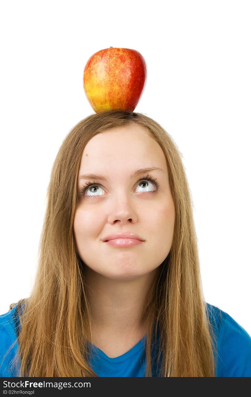 Portrait of thoughtful woman with apple on her head, over white. Portrait of thoughtful woman with apple on her head, over white