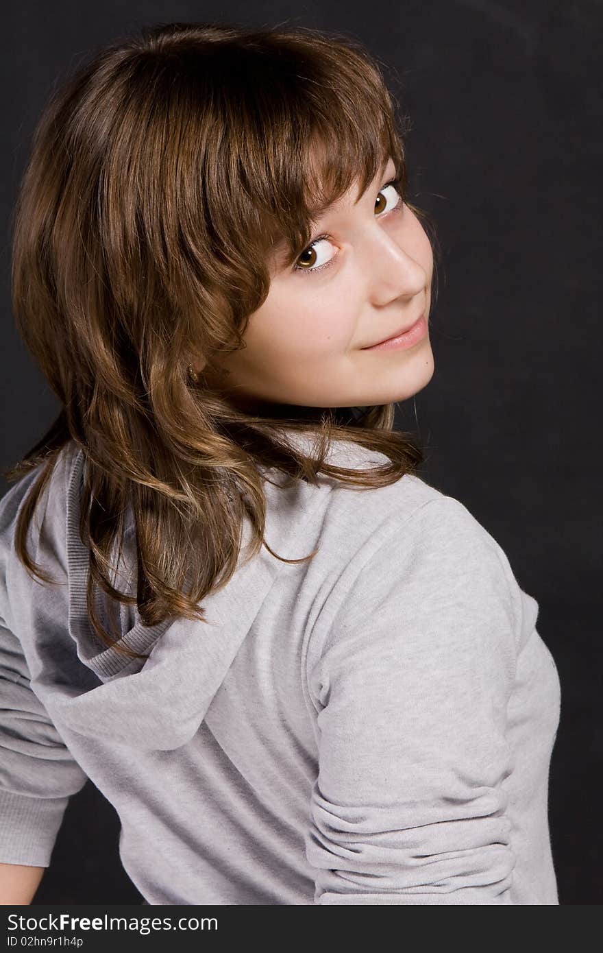 Portrait of teenage girl on a black background. Portrait of teenage girl on a black background