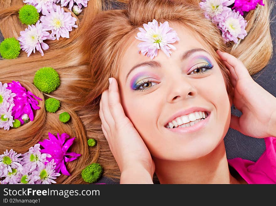 Young pretty girl portrait with flower ornament. Young pretty girl portrait with flower ornament