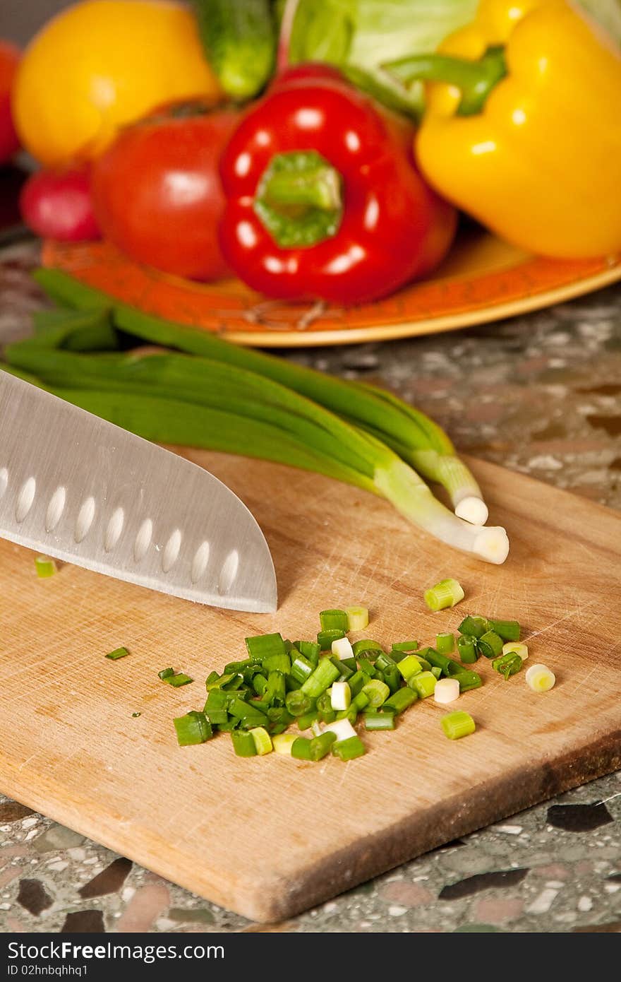 Sliced onion with colorful peppers