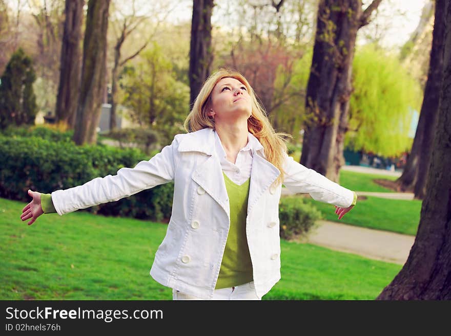 Young girl enjoying nature after office work