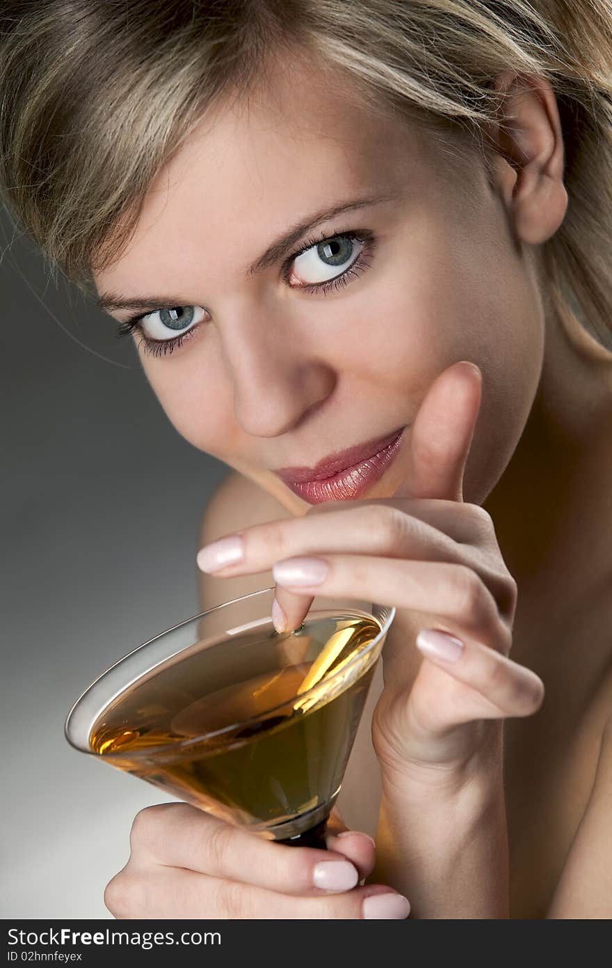 Woman with glass of cocktail