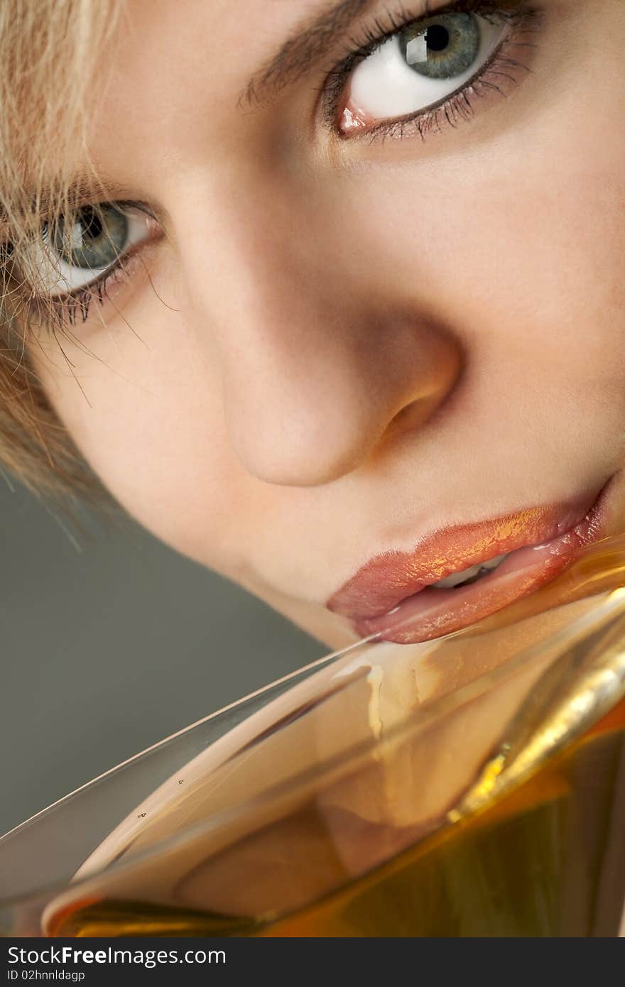 Woman with glass of cocktail