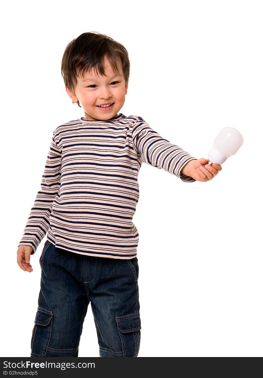 Portrait of happy child holding an energy efficiency light bulb isolated on white. Portrait of happy child holding an energy efficiency light bulb isolated on white.