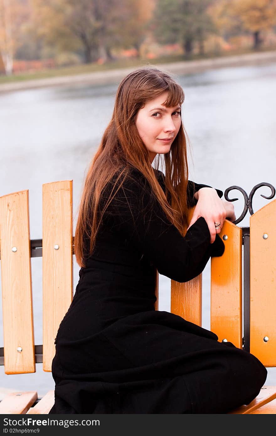 Portrait of  lady in black dress in the park