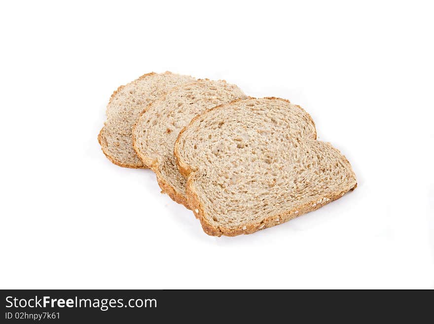 Three slices of bread on a white background. Three slices of bread on a white background