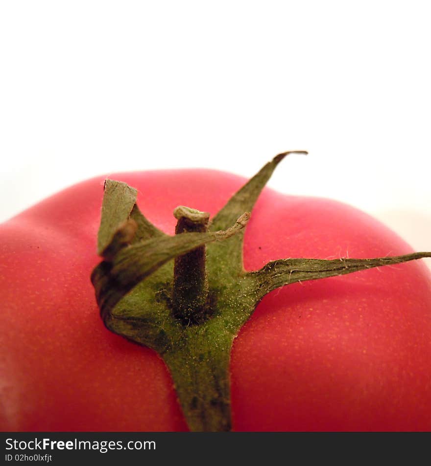 Isolated red tomato on white background