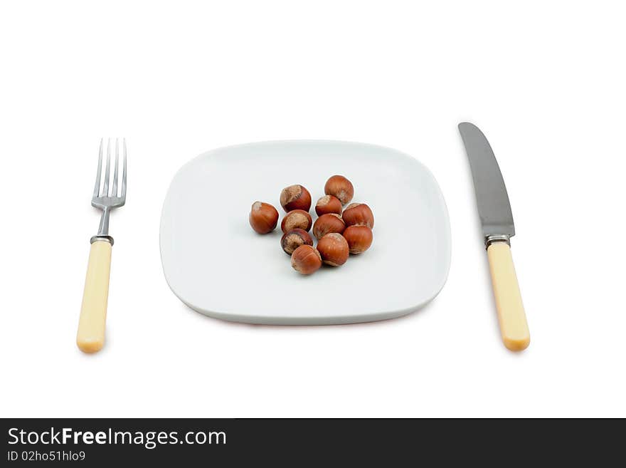 Knife, plug and plate with nuts