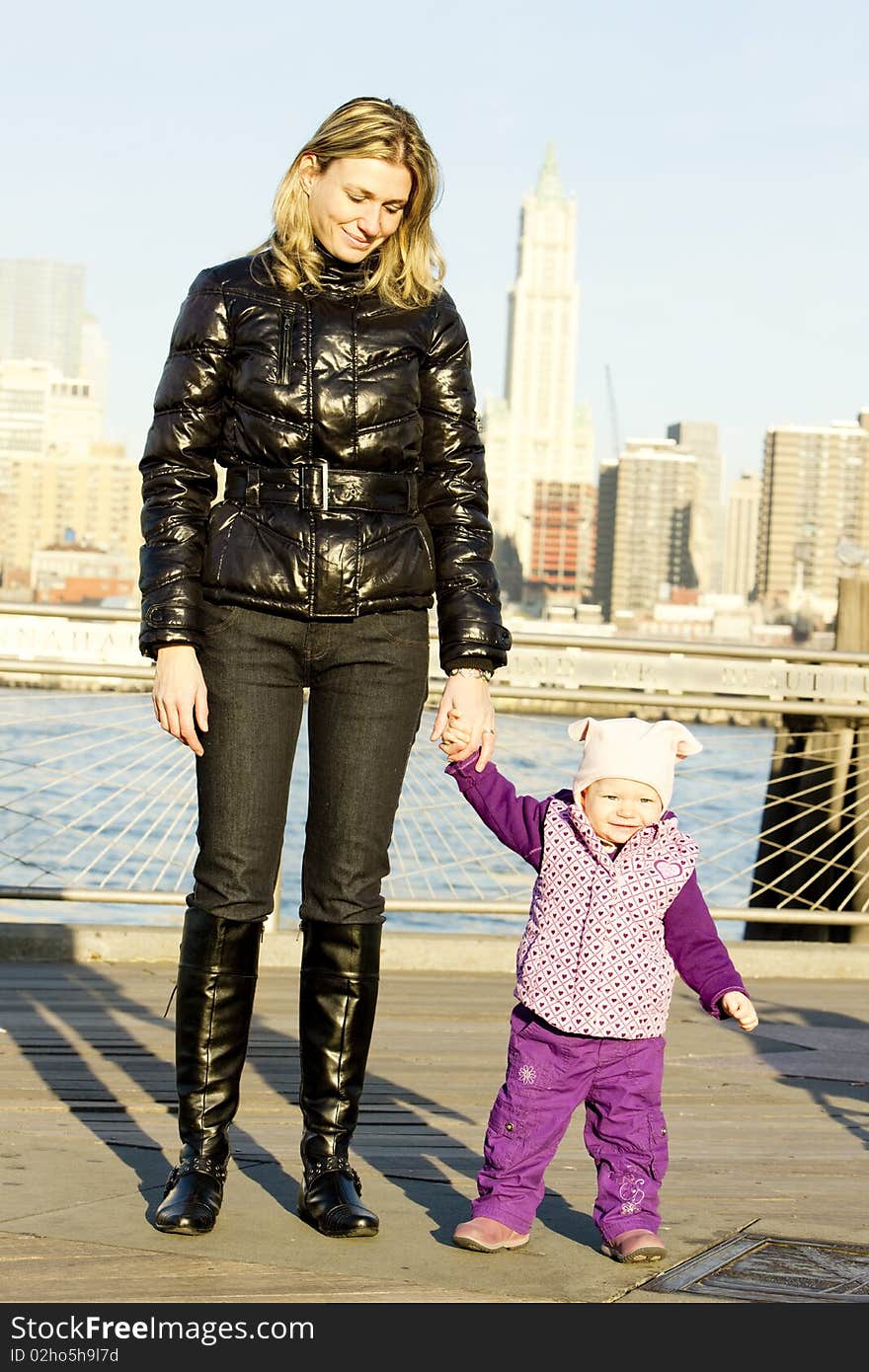 Woman with toddler at Manhattan, New York City, USA. Woman with toddler at Manhattan, New York City, USA