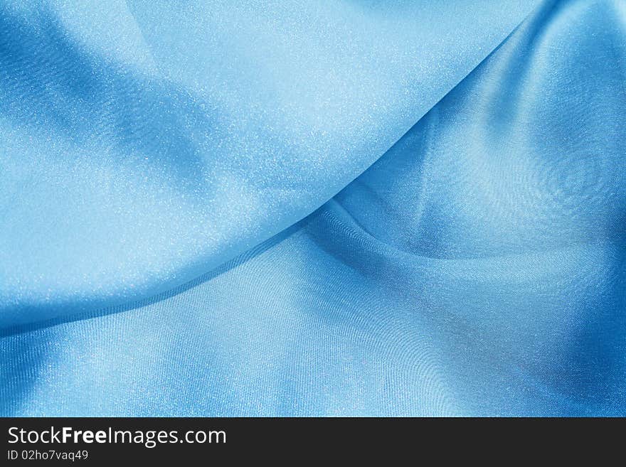 The texture of transparent light blue material. The texture of transparent light blue material.