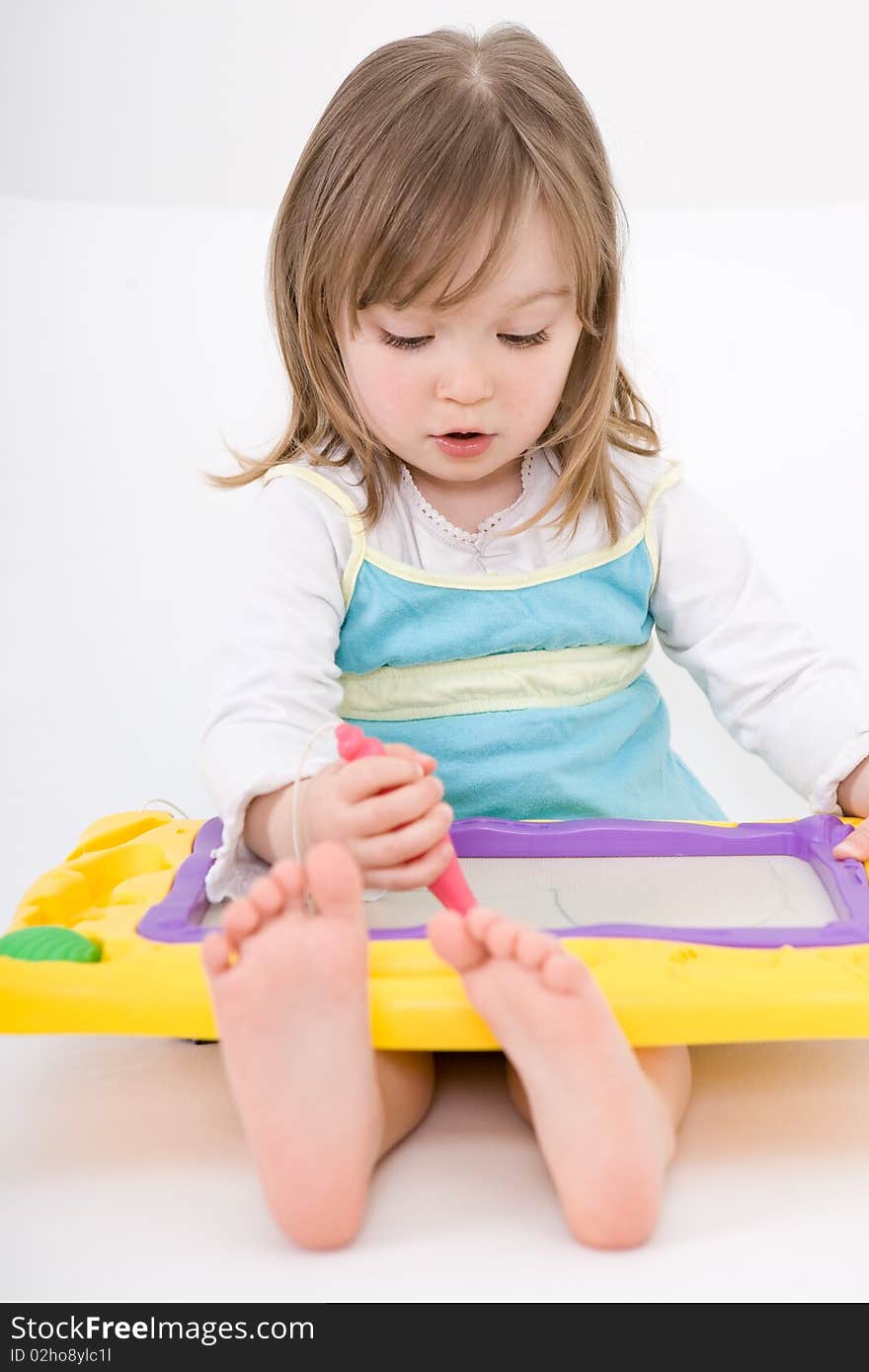 Sweet toddler little girl drawing