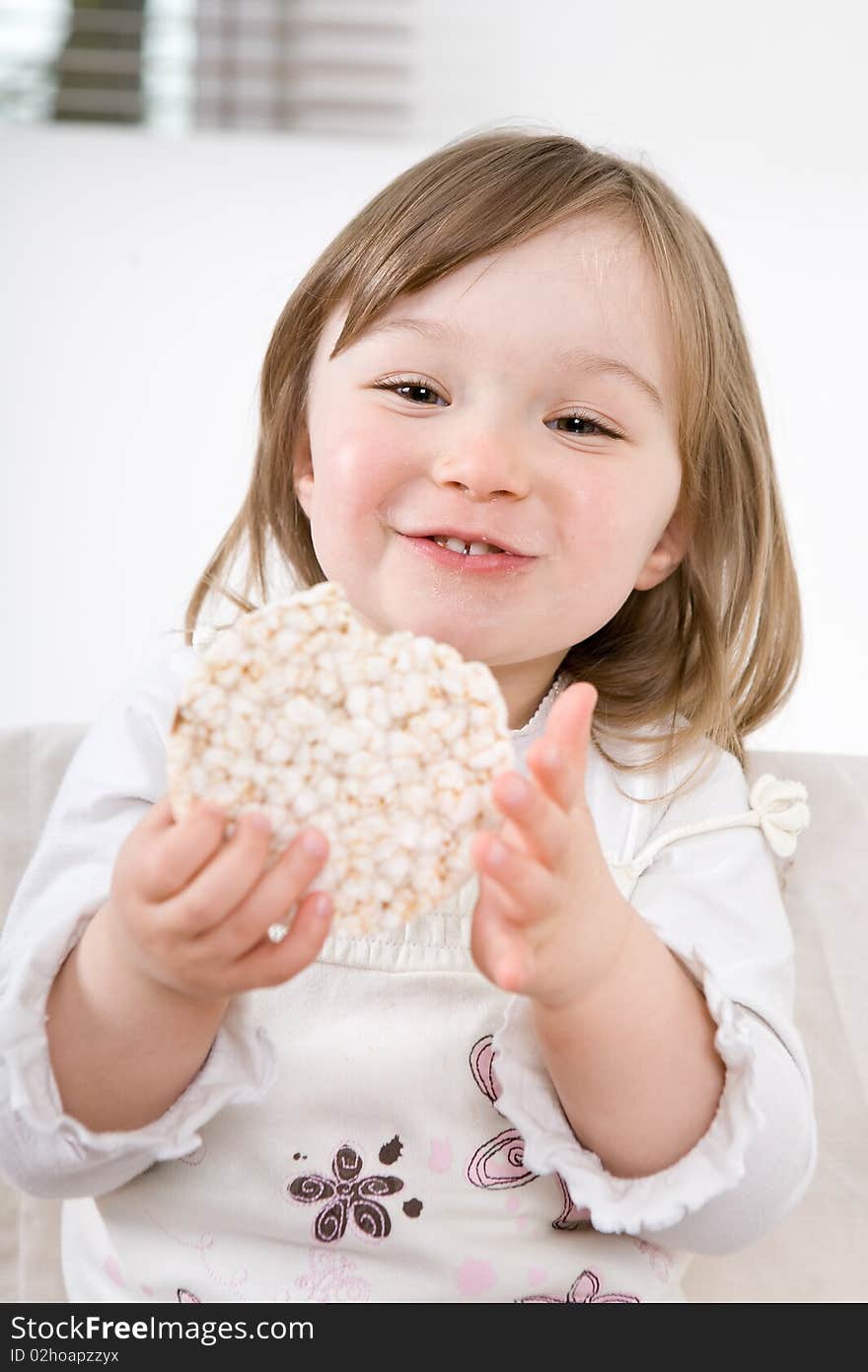 Sweet toddler little girl eating