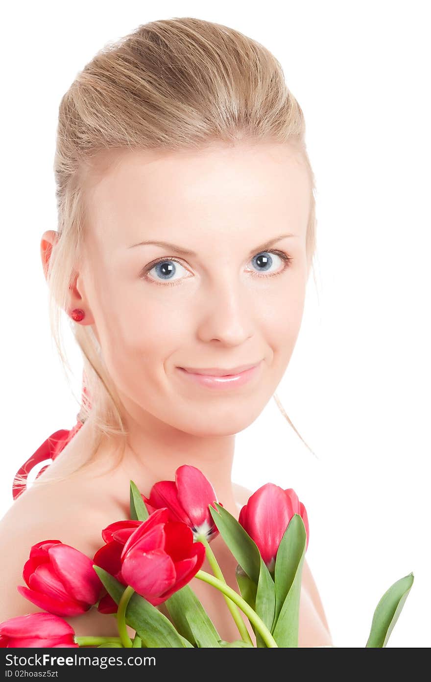 Young Woman With Bunch Of Tulips