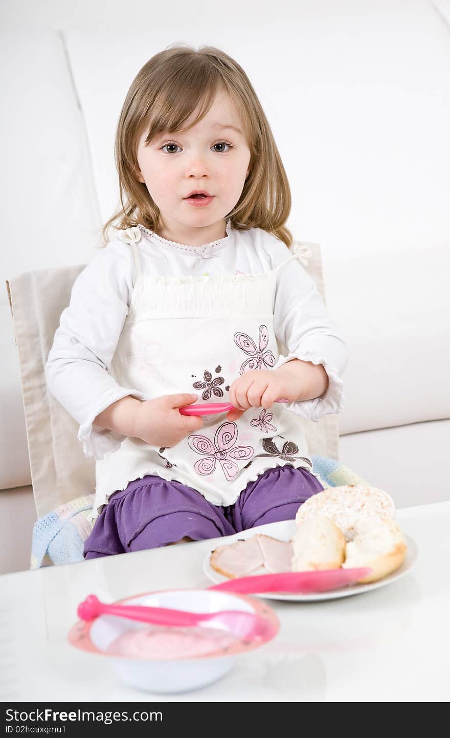 Sweet toddler little girl eating