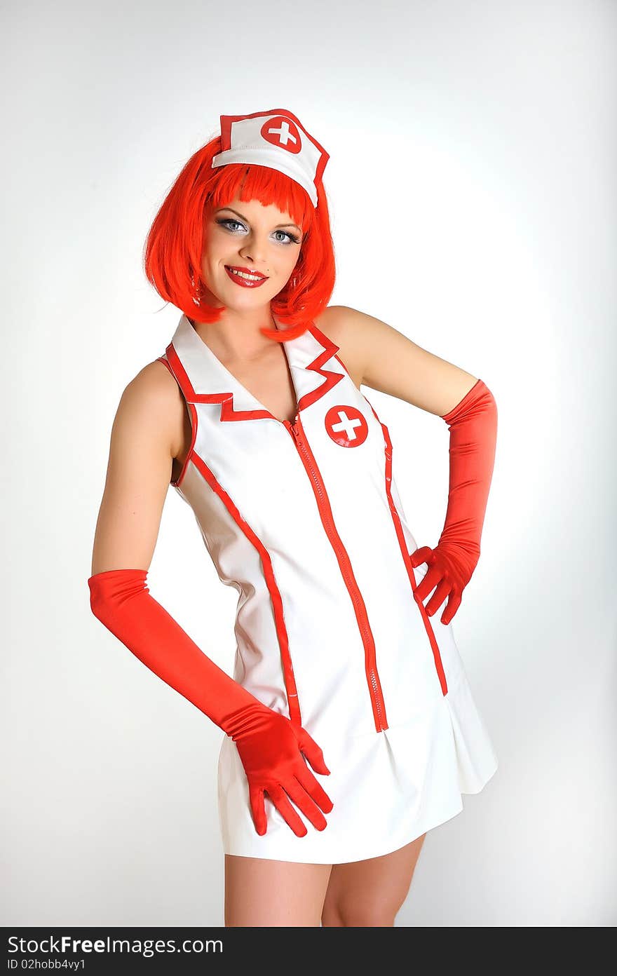 Young sexy nurse with red hair