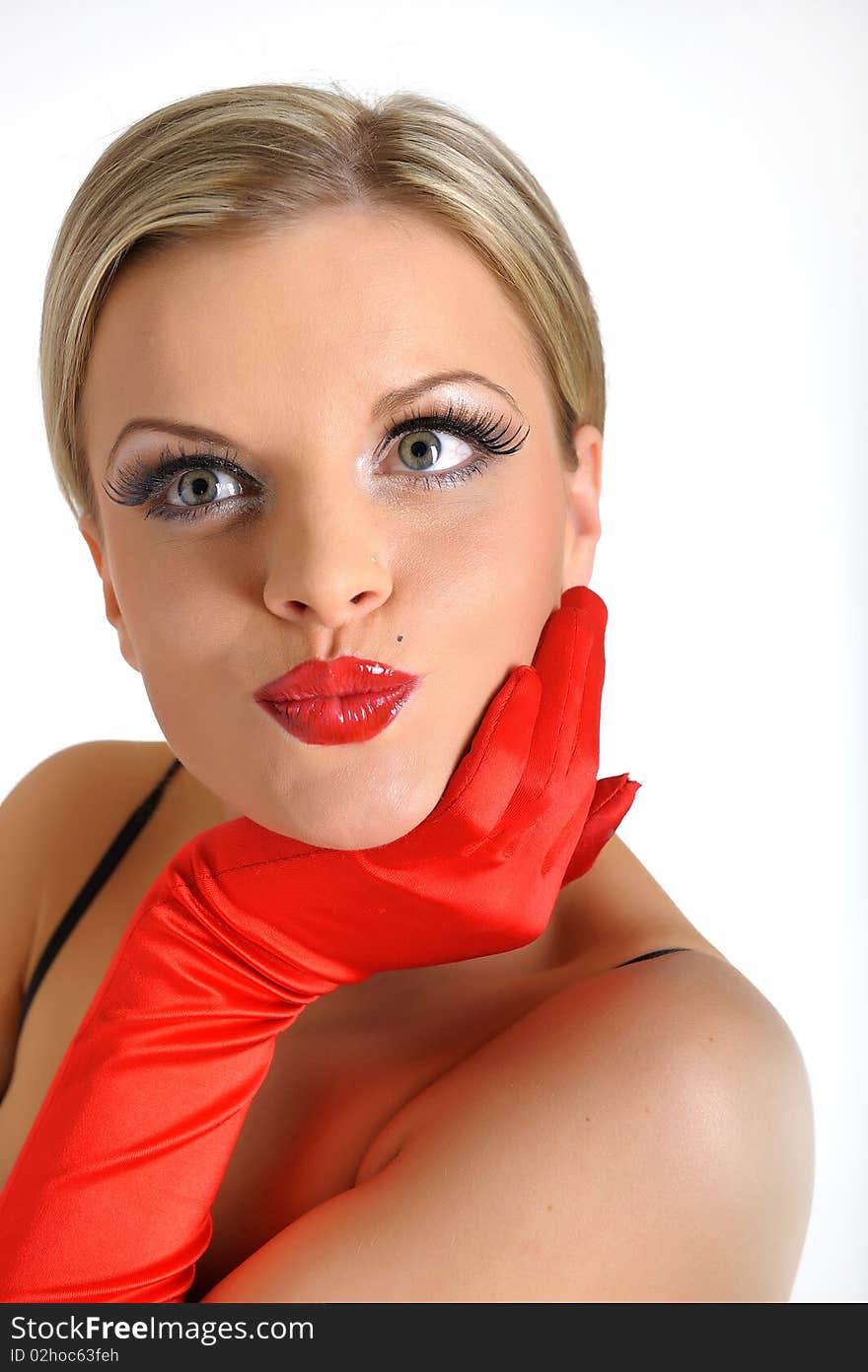 Young beauty female face with red shiny lips