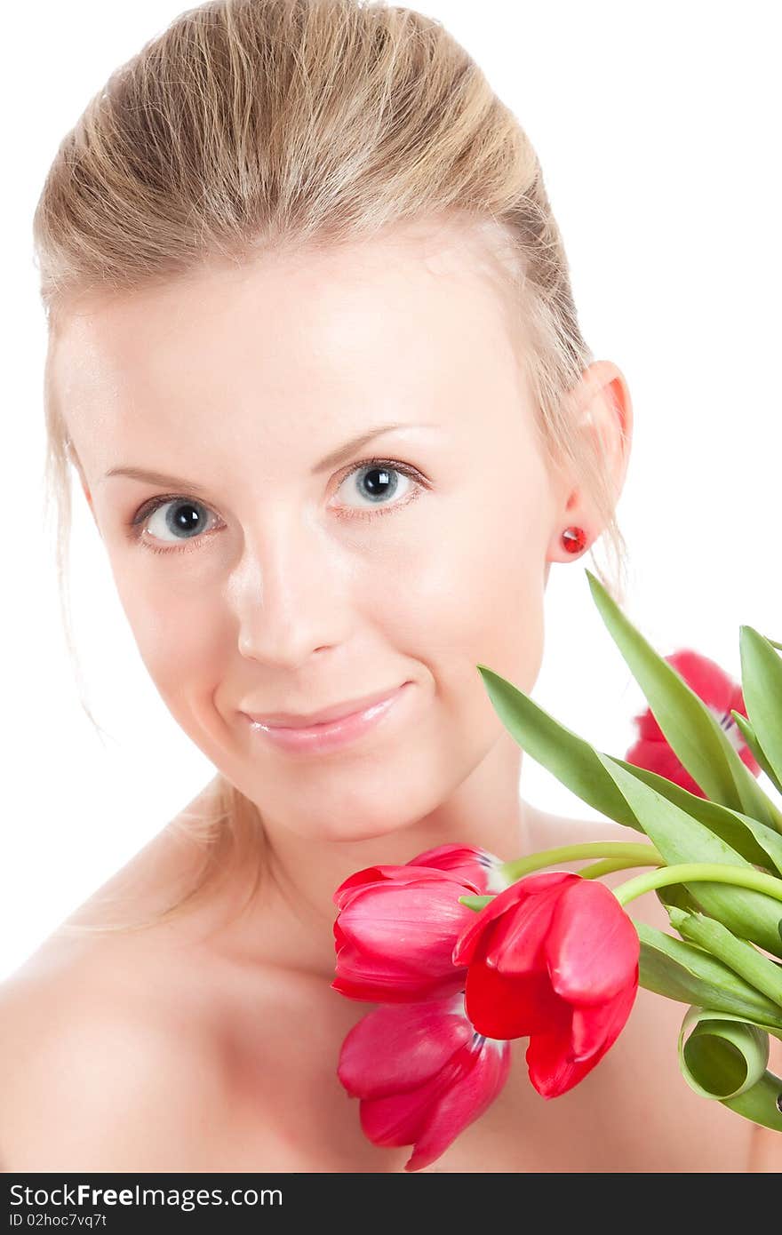 Young woman with bunch of tulip flowers. Isolated over white. Young woman with bunch of tulip flowers. Isolated over white