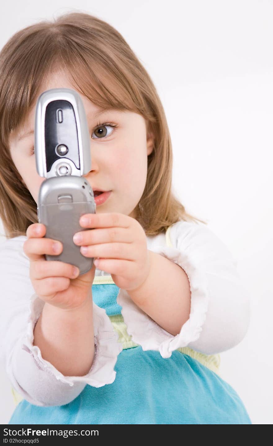 Little girl with mobile phone