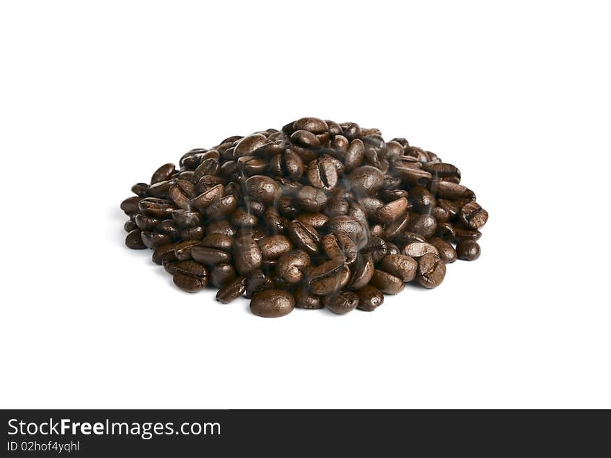 Seeds roasted coffee on a white background. Seeds roasted coffee on a white background.