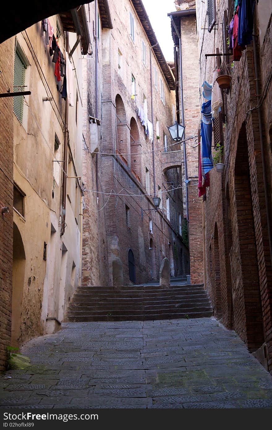 A narrow, steep street in Tuscany