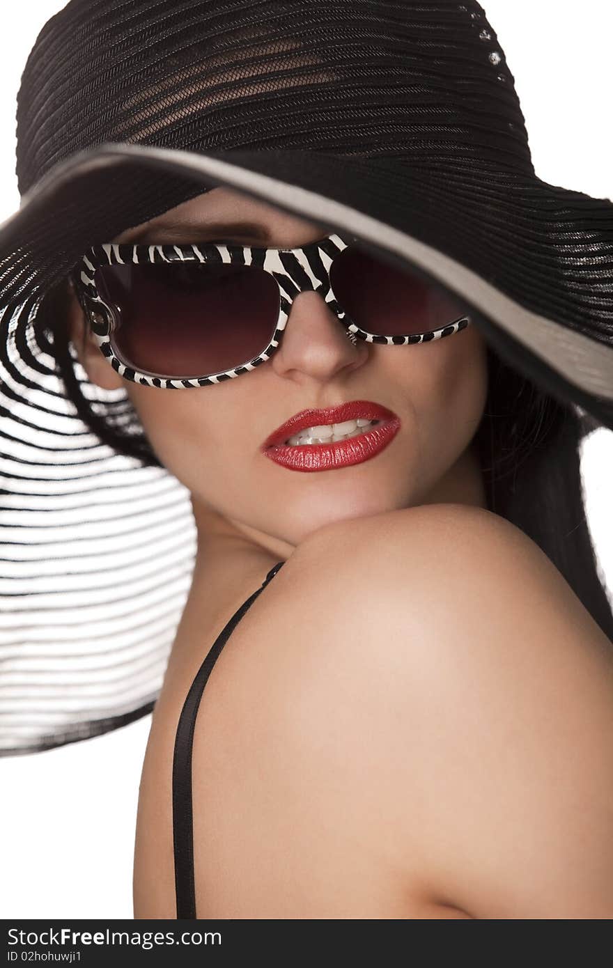 Model in striped hat and sunglasse