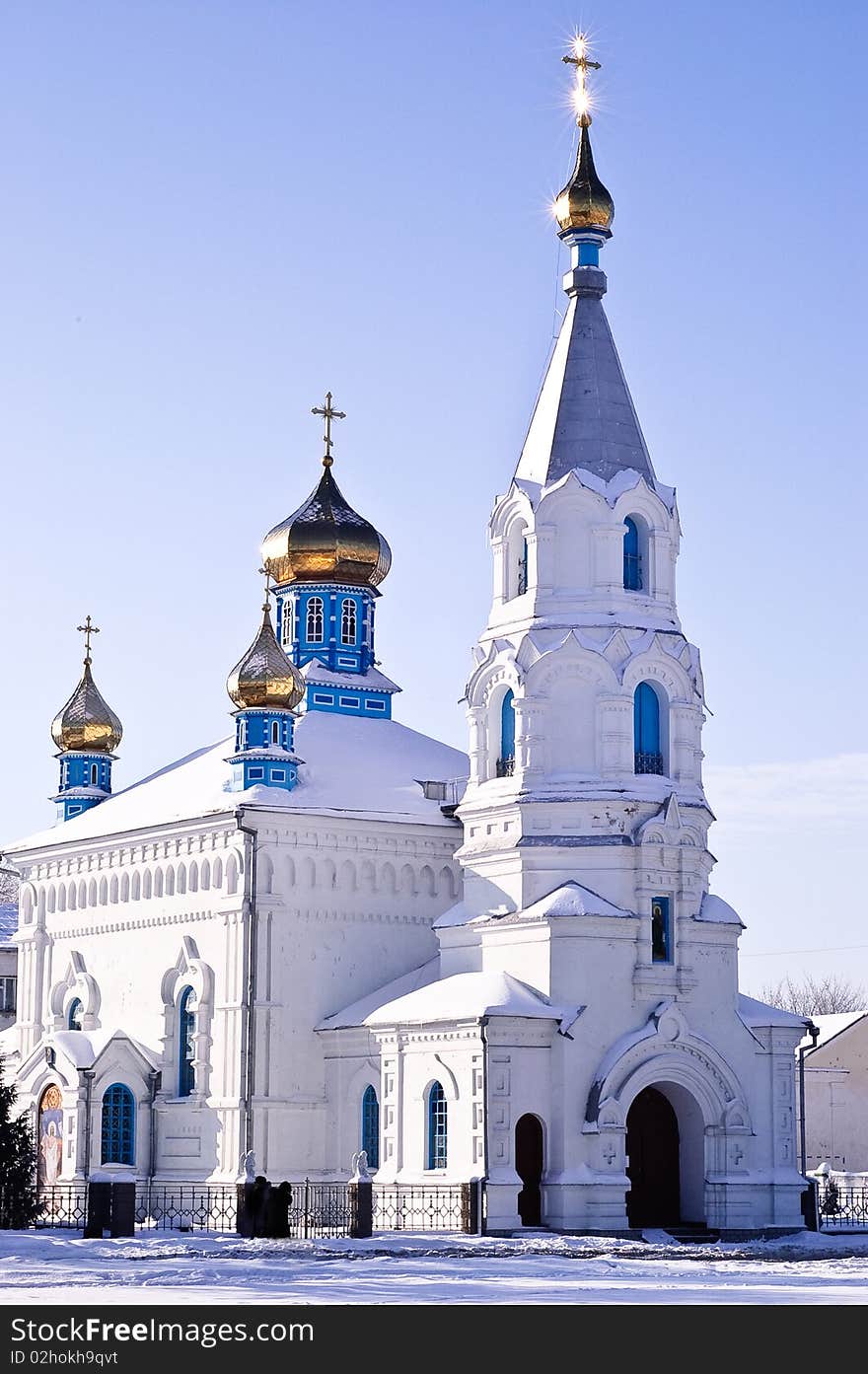 White church with gold domes. White church with gold domes