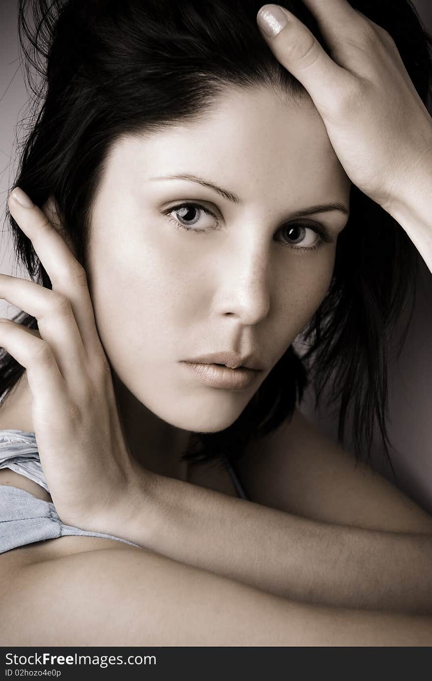 Beauty woman posing in blue isolated in studio. Beauty woman posing in blue isolated in studio