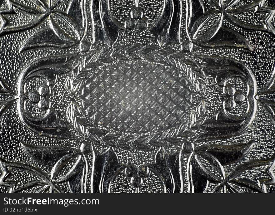 Ornaments with flowers on metal material, grey