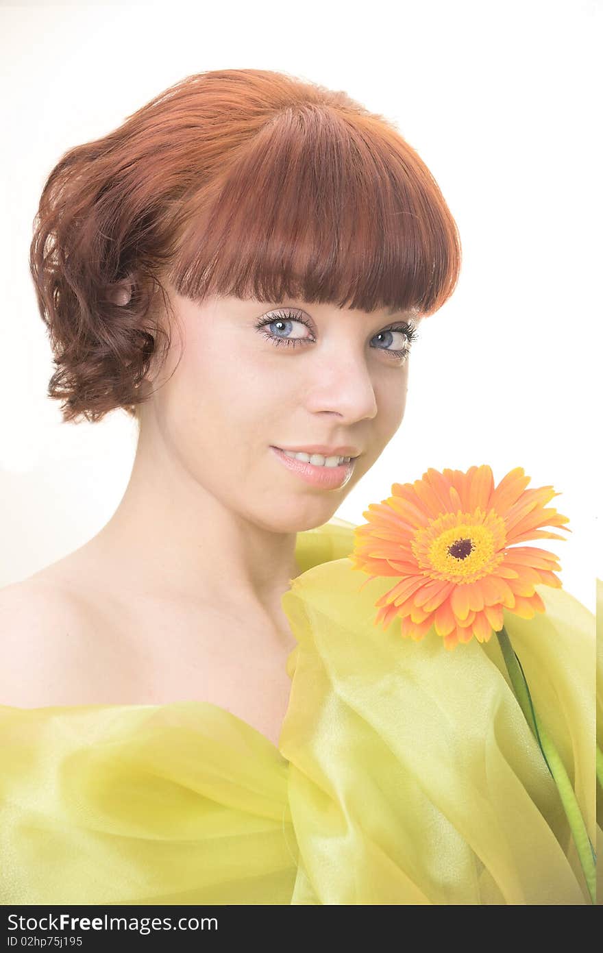 Portrait of the girl with red hair holds a flower. Portrait of the girl with red hair holds a flower