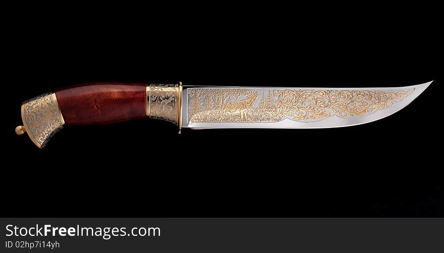 Beautiful knife with gold picture. Beautiful knife with gold picture