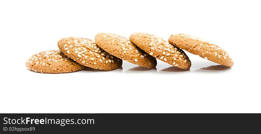 A pile of chocolate chip cookies isolated on a white background